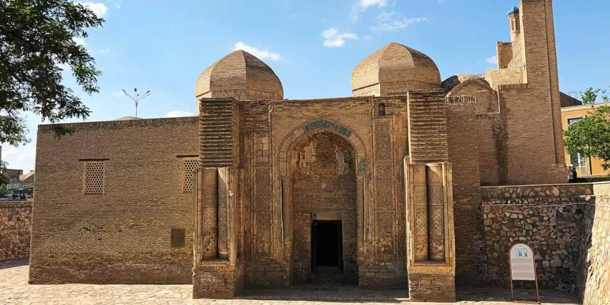 Carved stone and brick portal of Magoki Attori Mosque below street level