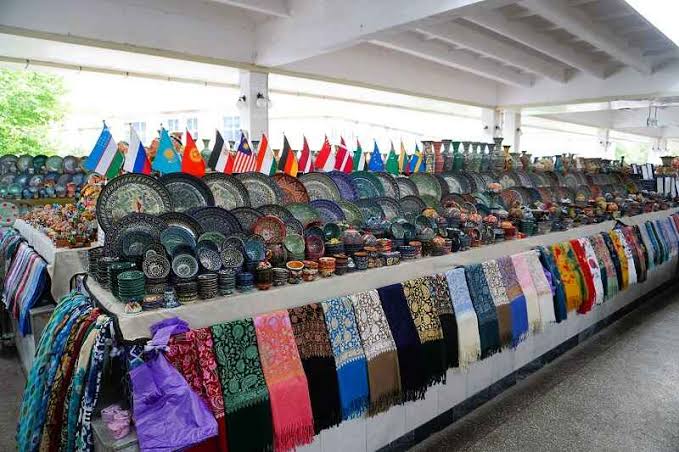 Colorful mounds of spices and dried fruits at the bustling Siab Bazaar